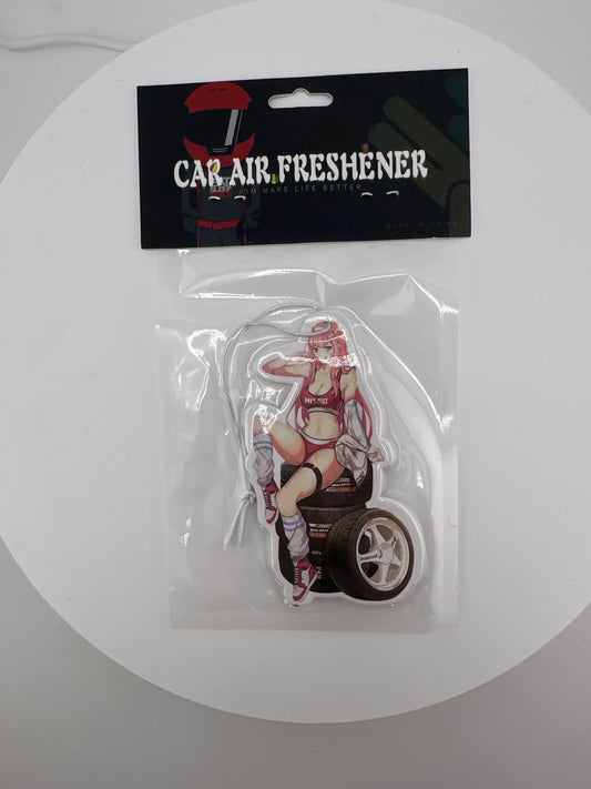 Cute anime waifu sitting on tire’s air freshener - Chicano Spot